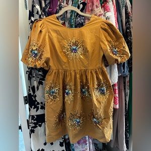 Queen of sparkles gold sunburst dress sz small nwt